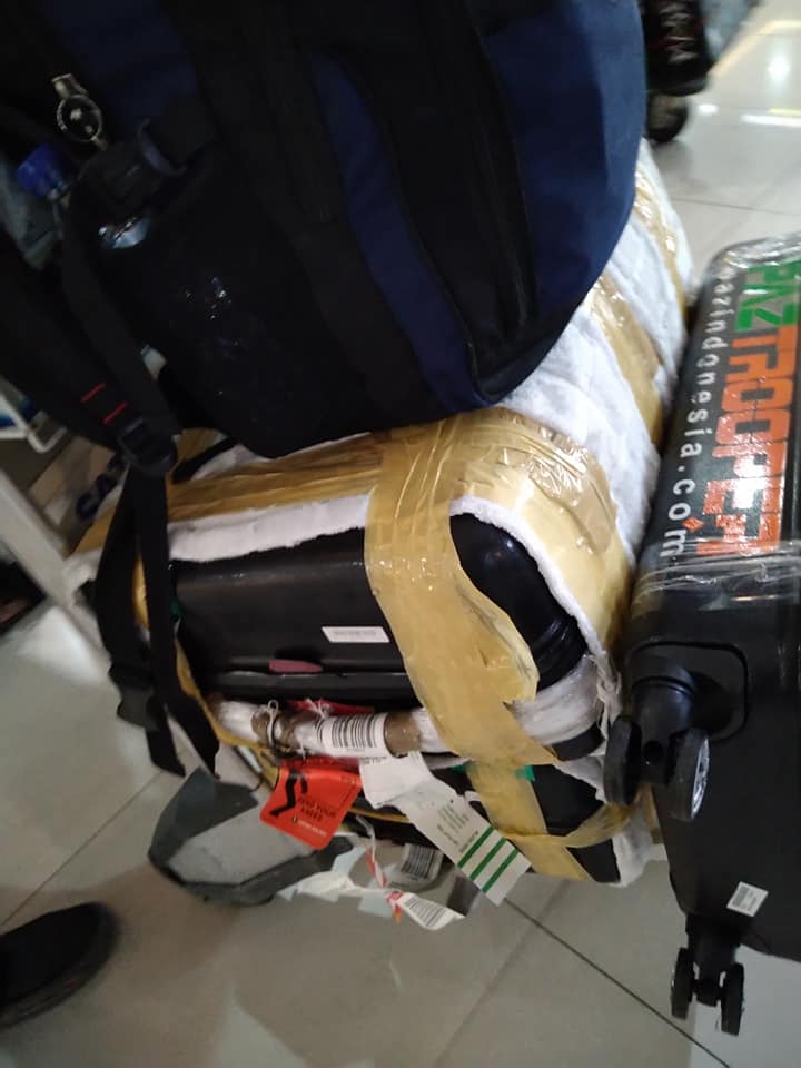 tips packing baju umroh koper laki laki